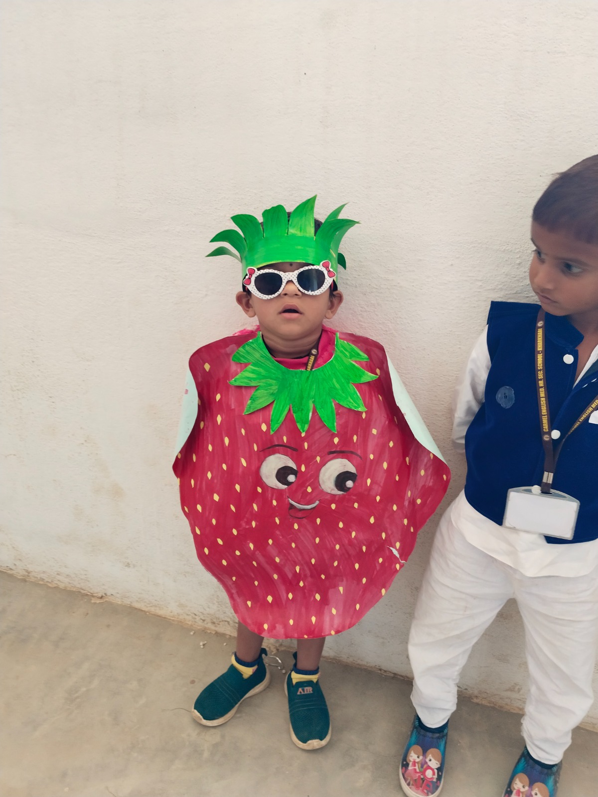 A young pupil in a handmade costume for a school activity