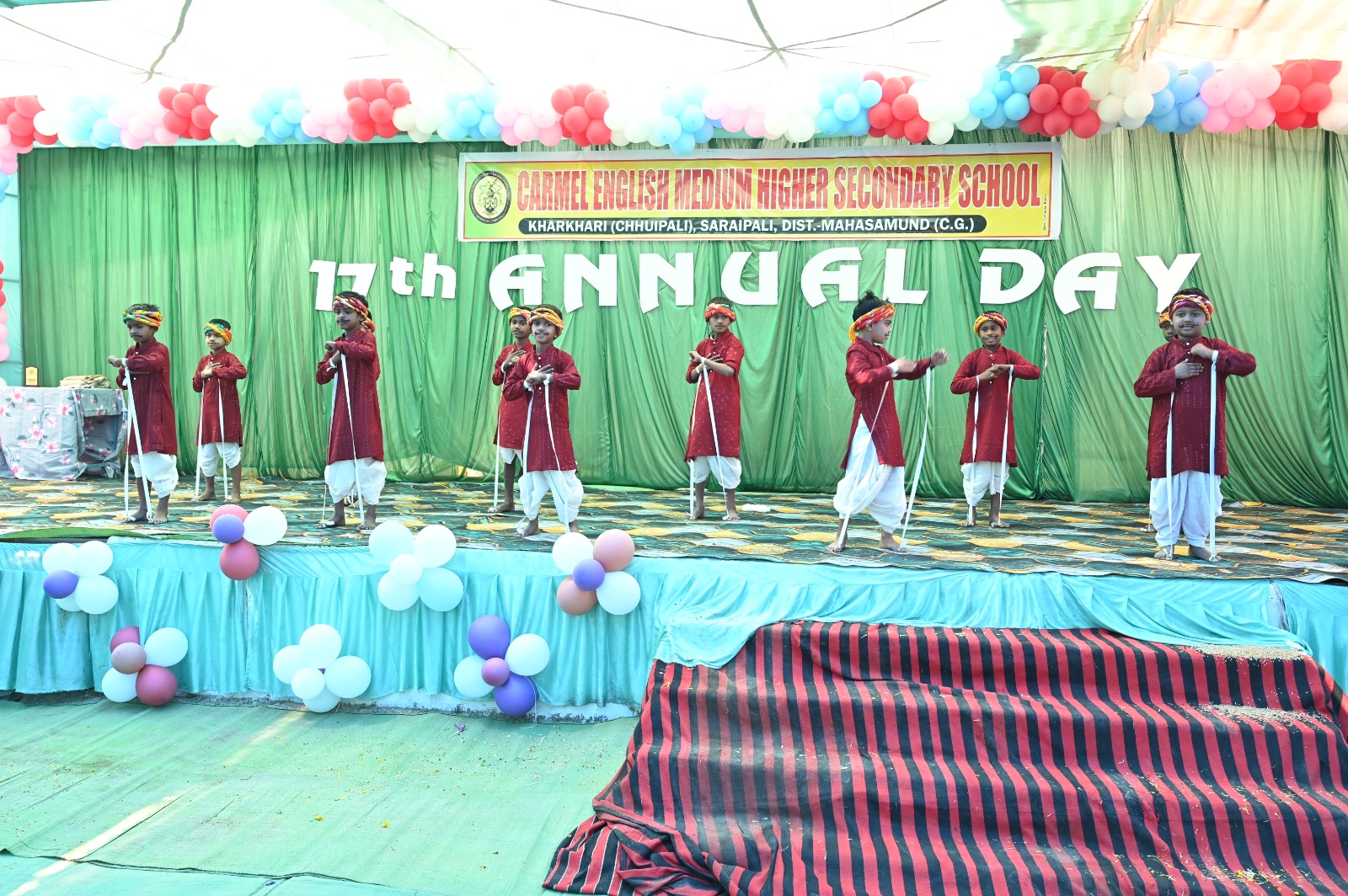 Students performing a folk dance at the school annual day